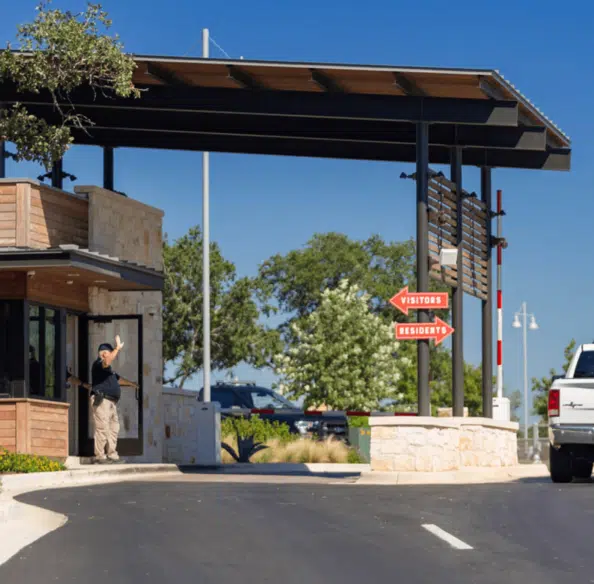Lifestyle at Kissing Tree - 24/7 Security Guard Welcoming Guests to the Neighborhood