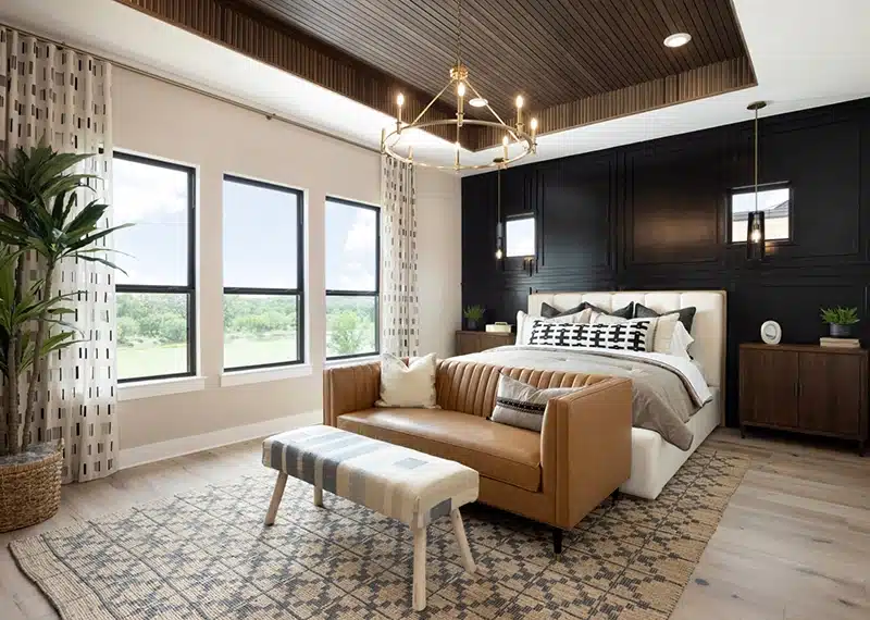 interior of bedroom of model home at kissing tree