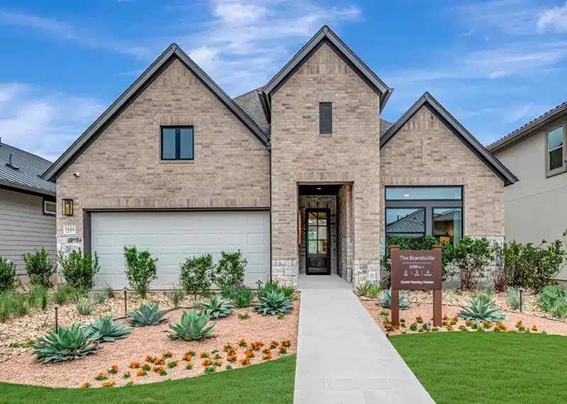 front exterior image of model home at kissing tree