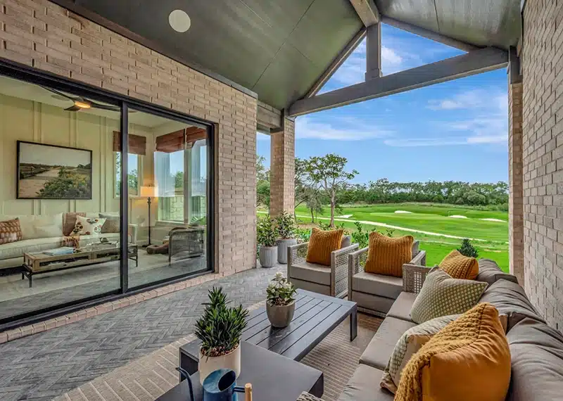 view from back porch facing golf course at kissing tree